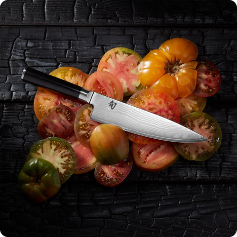 Shun lifestyle kitchen setting with knife on board illustrating daily cooking versatility