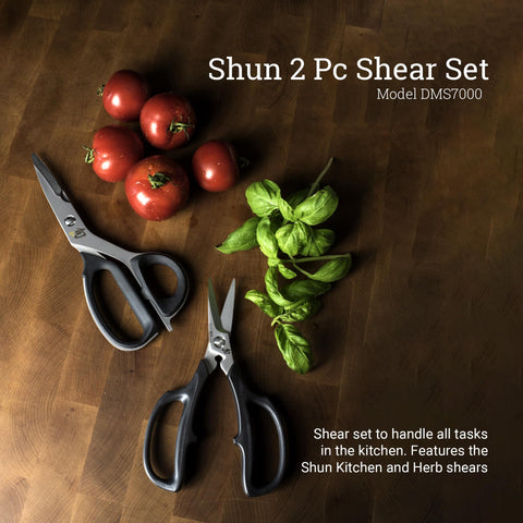 Shun kitchen shear close-up showing 420J2 steel notch and sharp edge for tough cutting