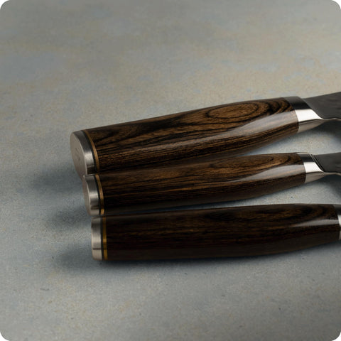 Shun premier pakkawood handle profile offering ergonomic secure grip