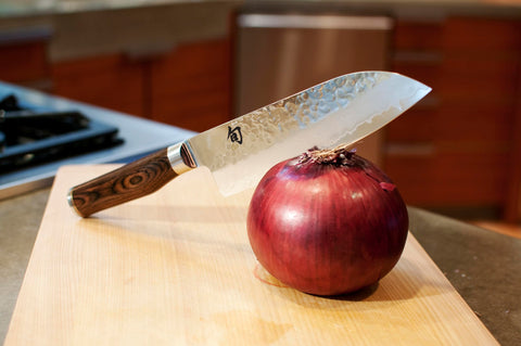 Shun Premier tsuchime hammered finish close-up reduces food sticking and drag