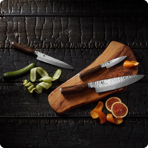 Shun premier scale comparison on cutting board illustrating compact versatility