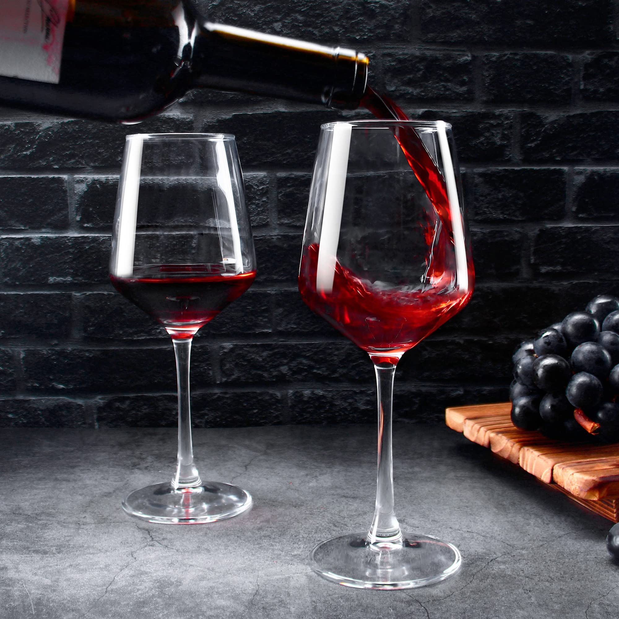 SHYRC wine glass next to bottle showing scale and benefit of 12oz capacity