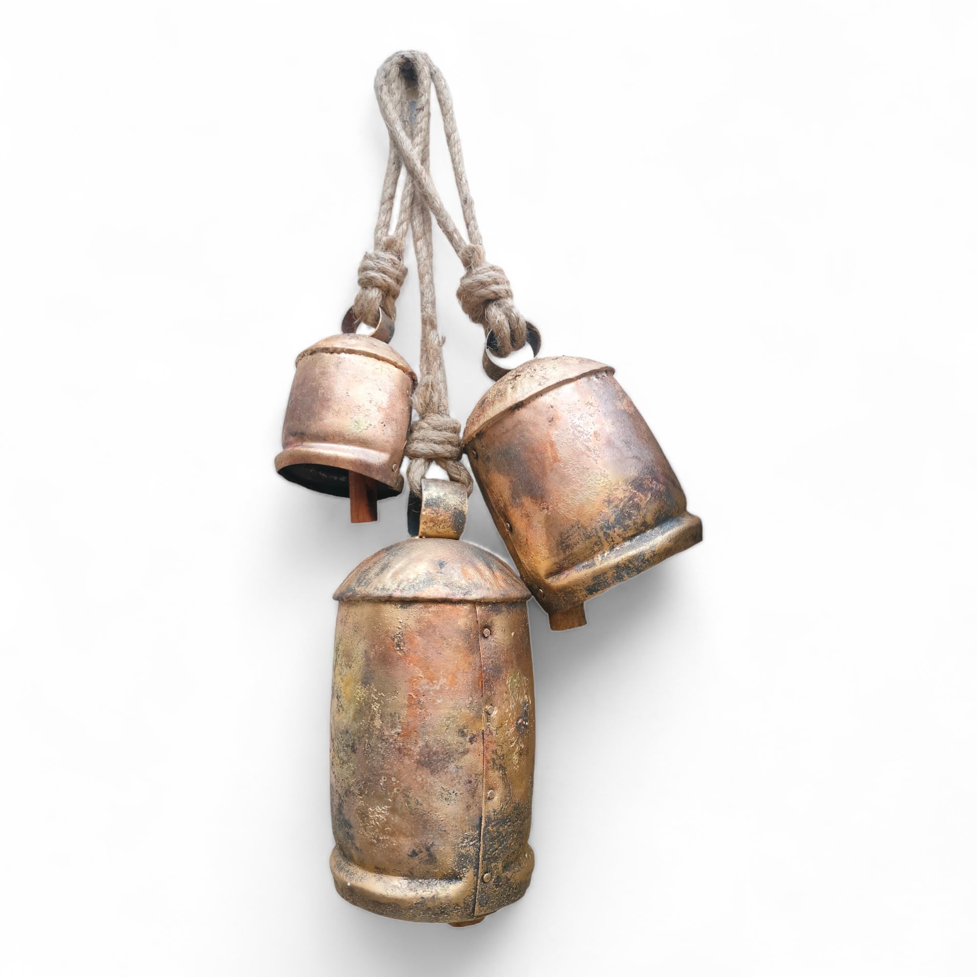 Siddhivinayak Overseas bells hanging on a wooden door adding decorative charm and sound