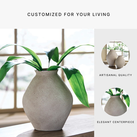 Signature Design by Ashley vase styled with pampas grass adding instant warmth