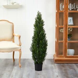 Silk Tree Warehouse topiary held by hand to show 3 foot height and portable size