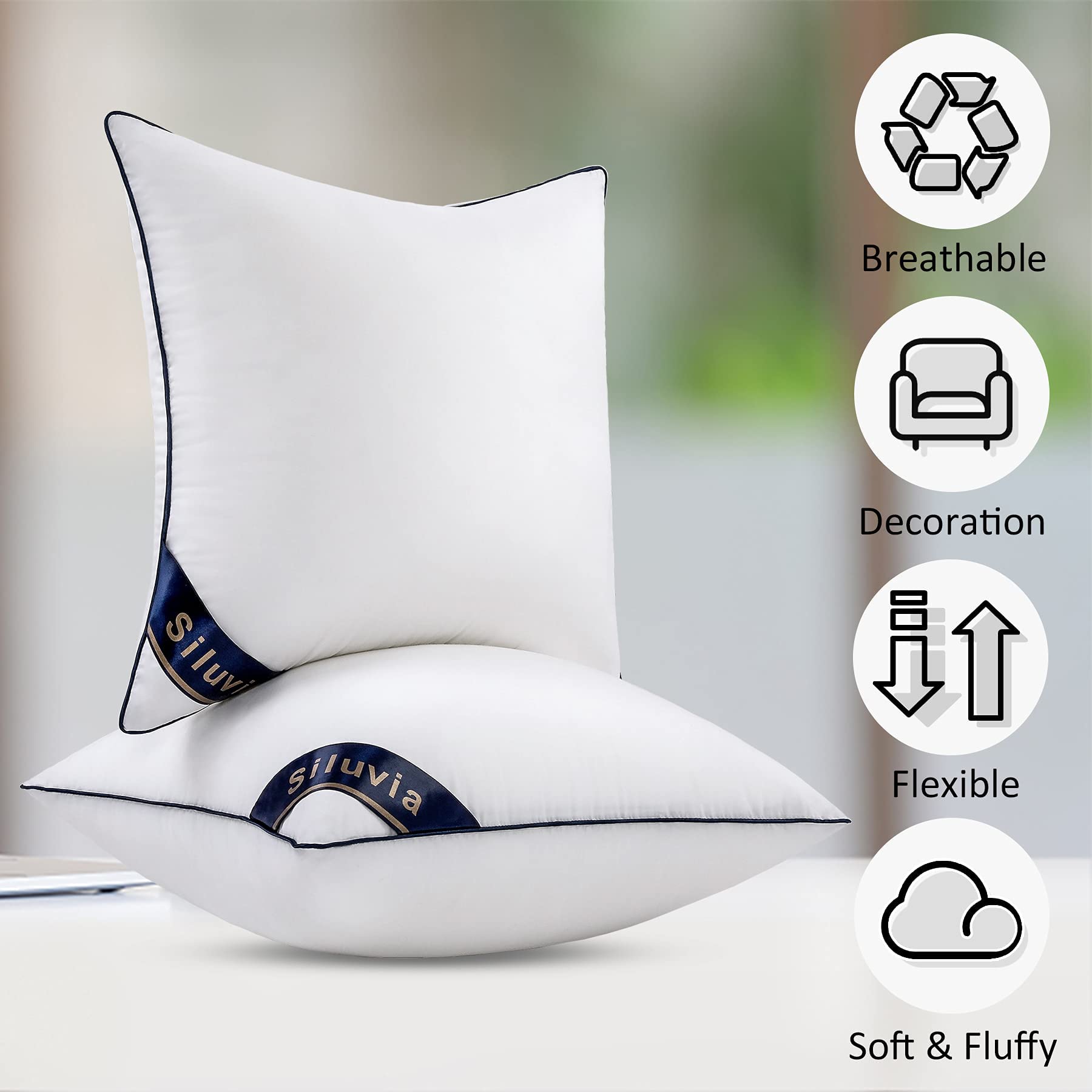 Siluvia 26x26 pillow beside chair demonstrating scale and proportion
