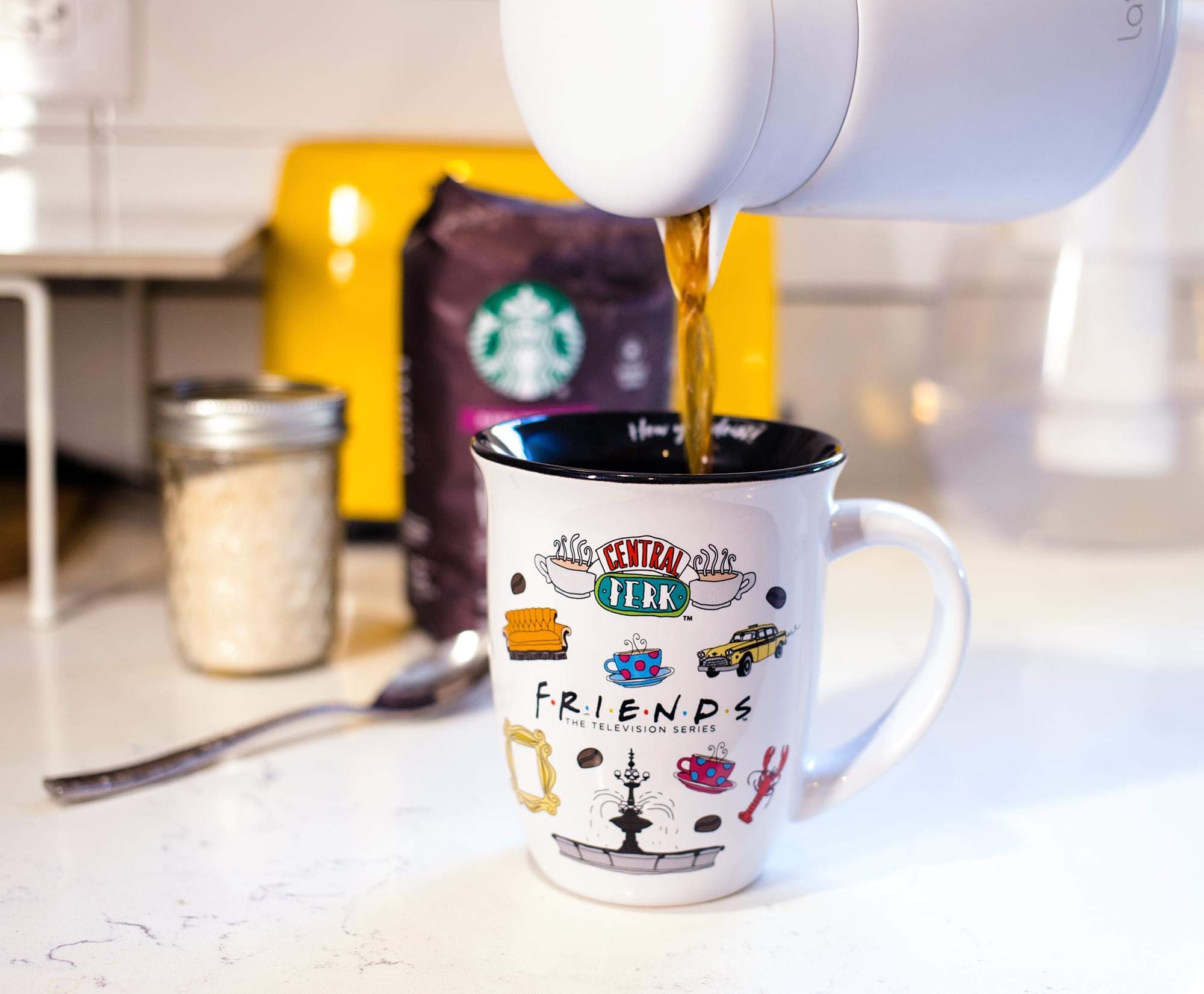 Silver Buffalo mug in use with cappuccino, demonstrates wide rim for foam access