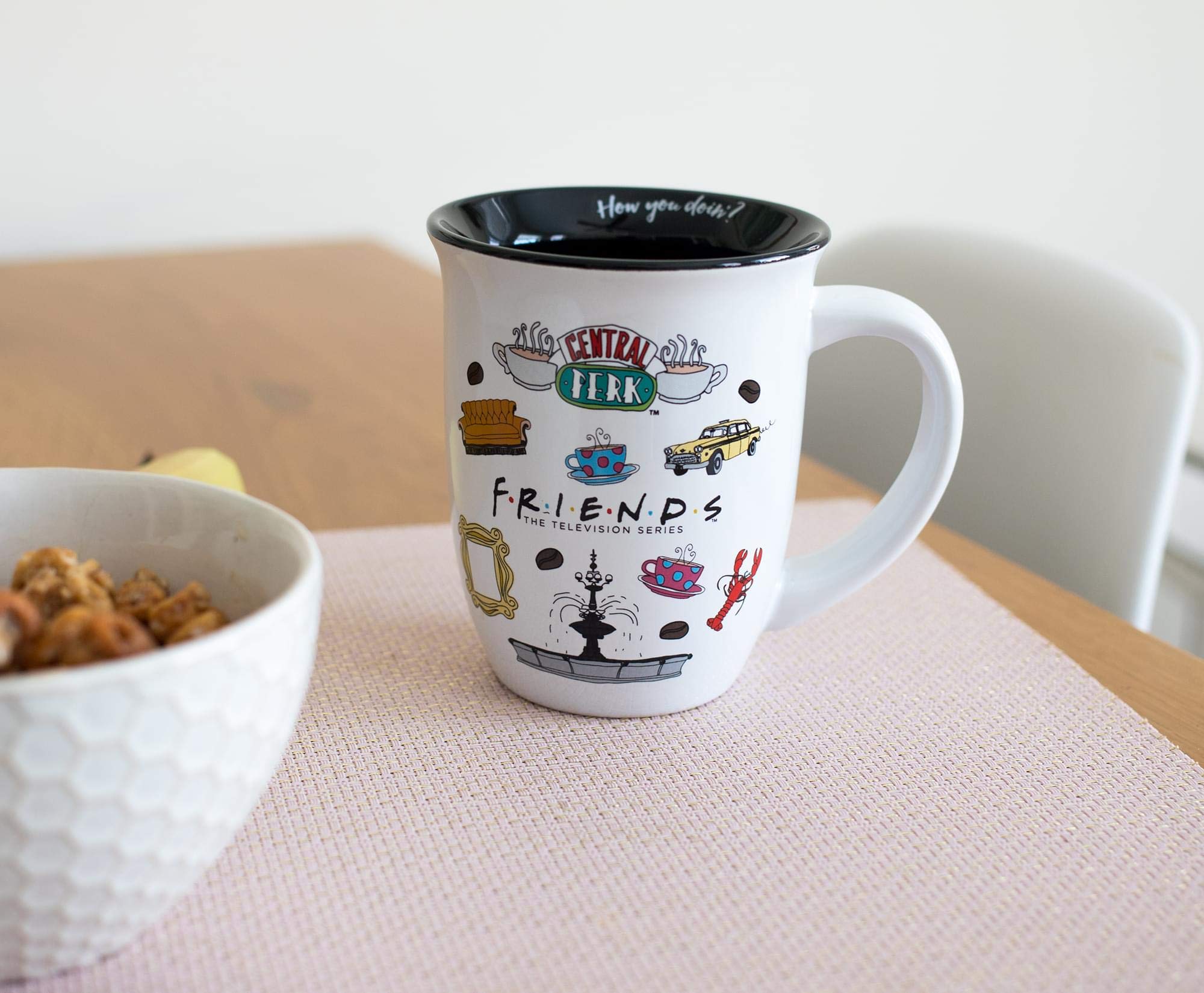 Silver Buffalo mug styled on kitchen shelf, adds decorative fandom charm to décor