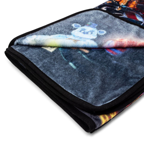 Silver Buffalo folded blanket beside ruler illustrating compact 45x60 size