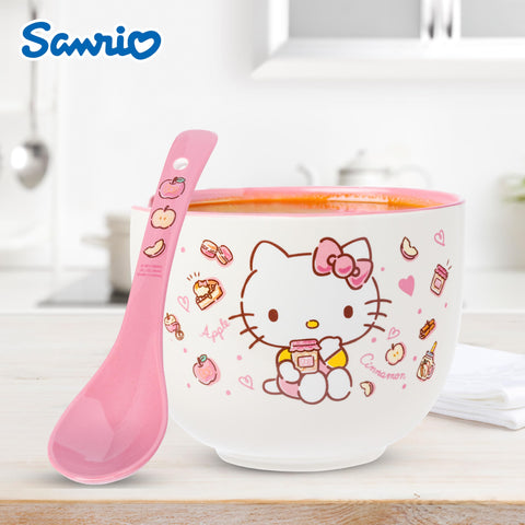Silver Buffalo Hello Kitty next to a measuring cup for scale, shows 20oz capacity