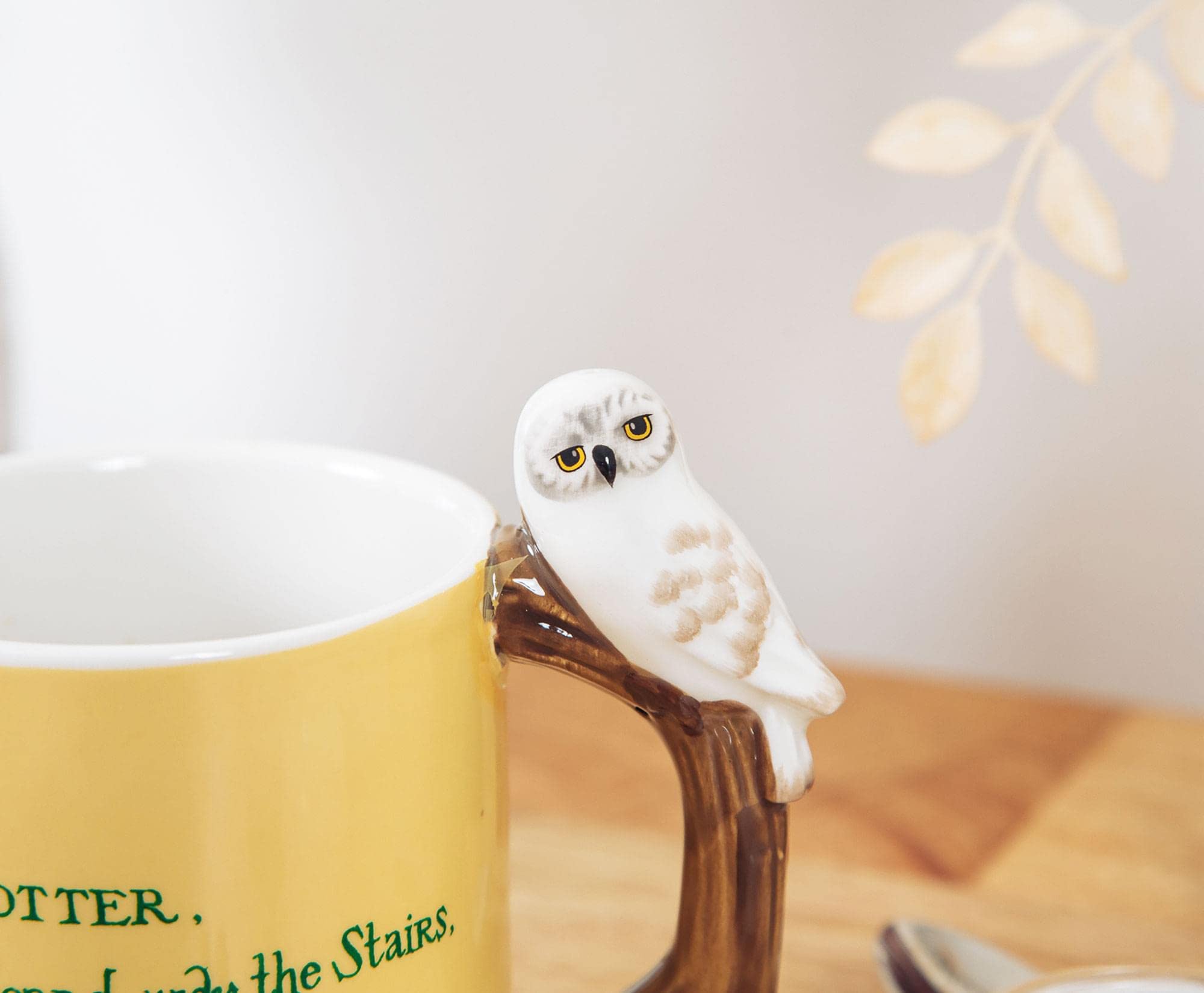 Silver Buffalo mug held in hand showing scale and comfortable sculpted-handle support