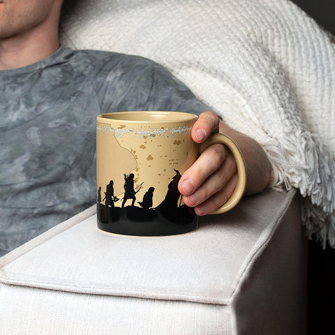 Silver Buffalo mug held in hand showing everyday use and comfortable handling benefit