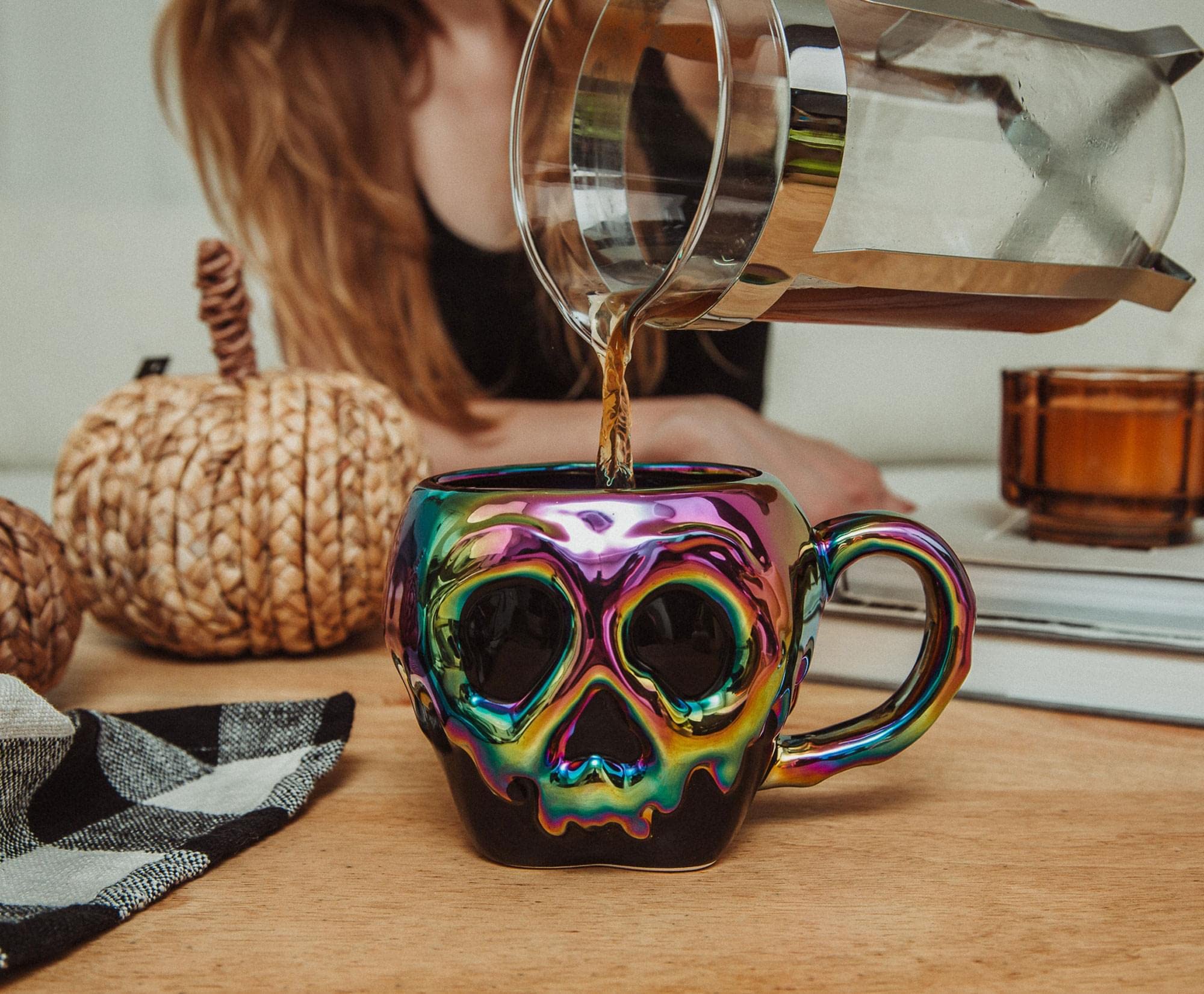 Silver Buffalo mug held in hand to show 20-ounce scale and practical serving benefit