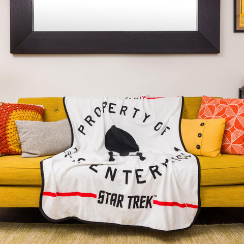 Silver Buffalo throw in use on sofa adding comfort and Star Trek style