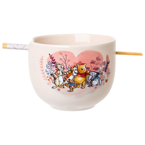 Silver Buffalo bowl front view showing Pooh group hug and cheerful design for playful meals