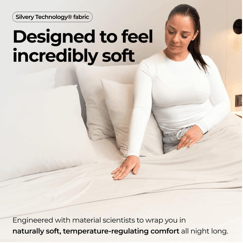 Silvery sheet on queen bed in styled room showing clean, calming sleep