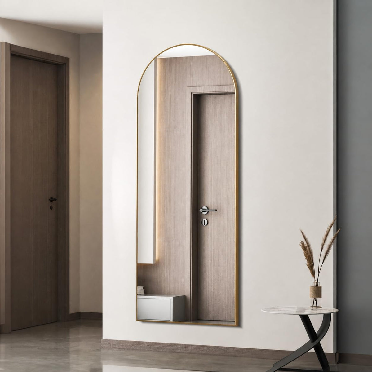 Simple Deluxe gold arched mirror front view offers full-length reflection and style