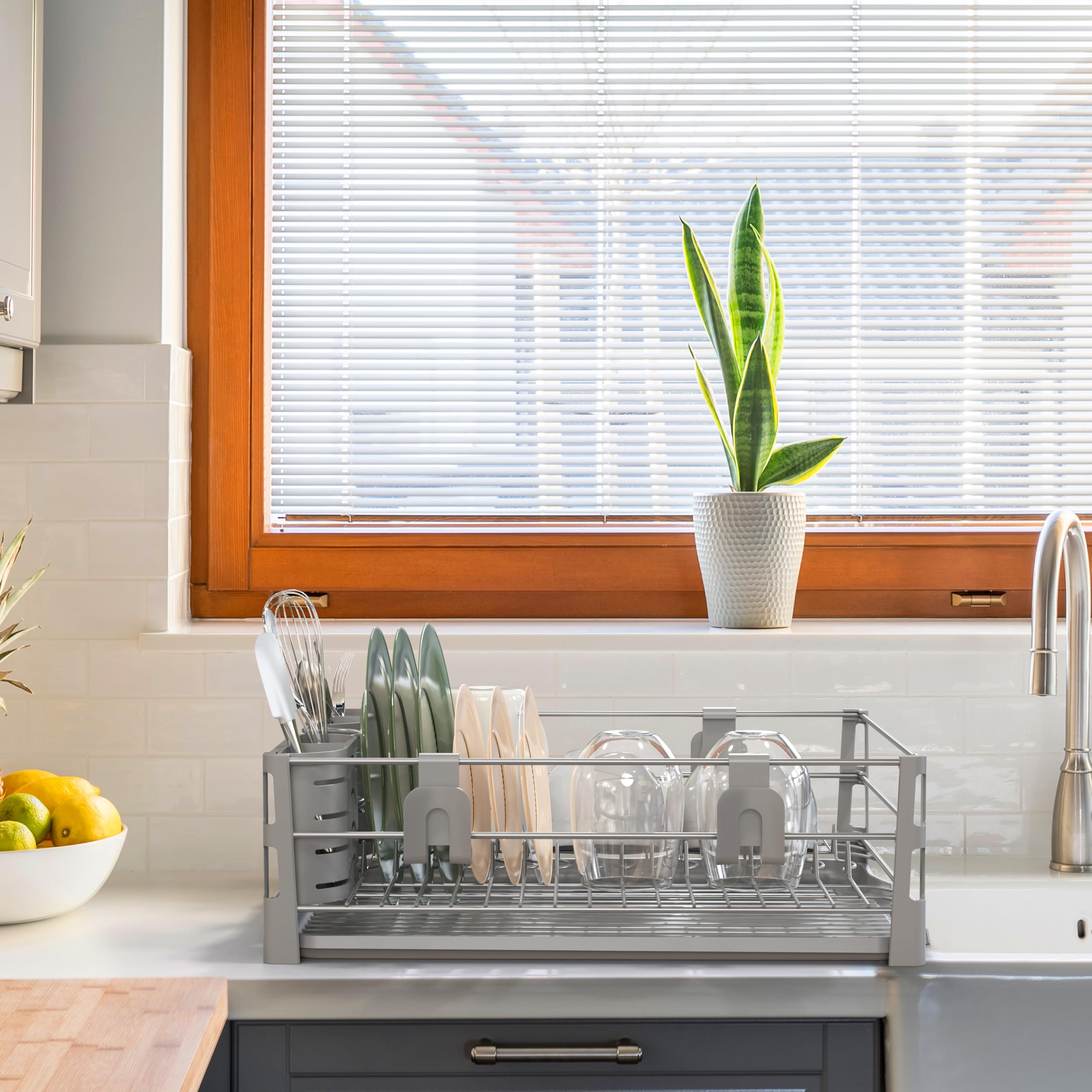 Simple Houseware size comparison next to sink showing compact footprint