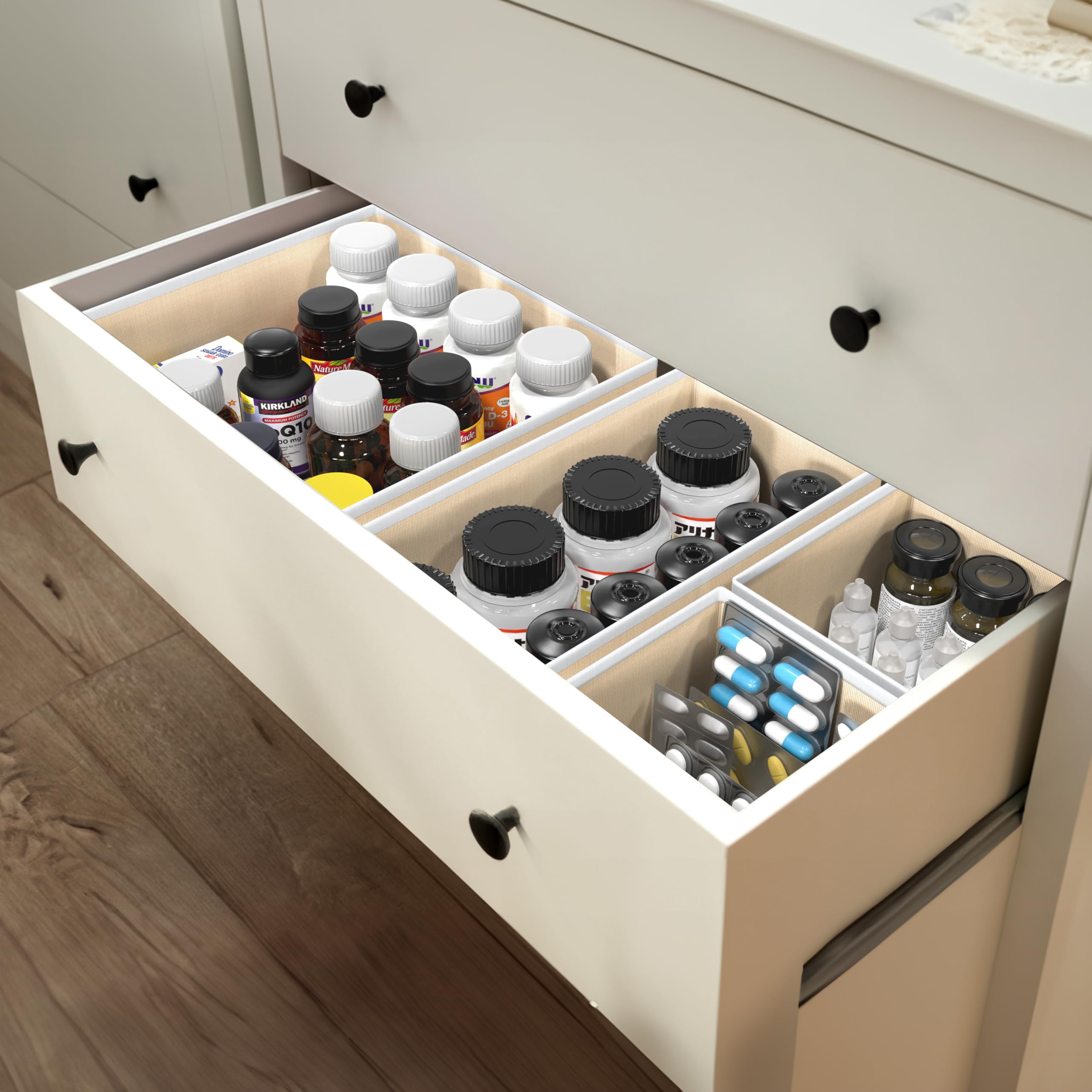 Simple Houseware organizers inside a nursery drawer demonstrating tidy baby garment storage