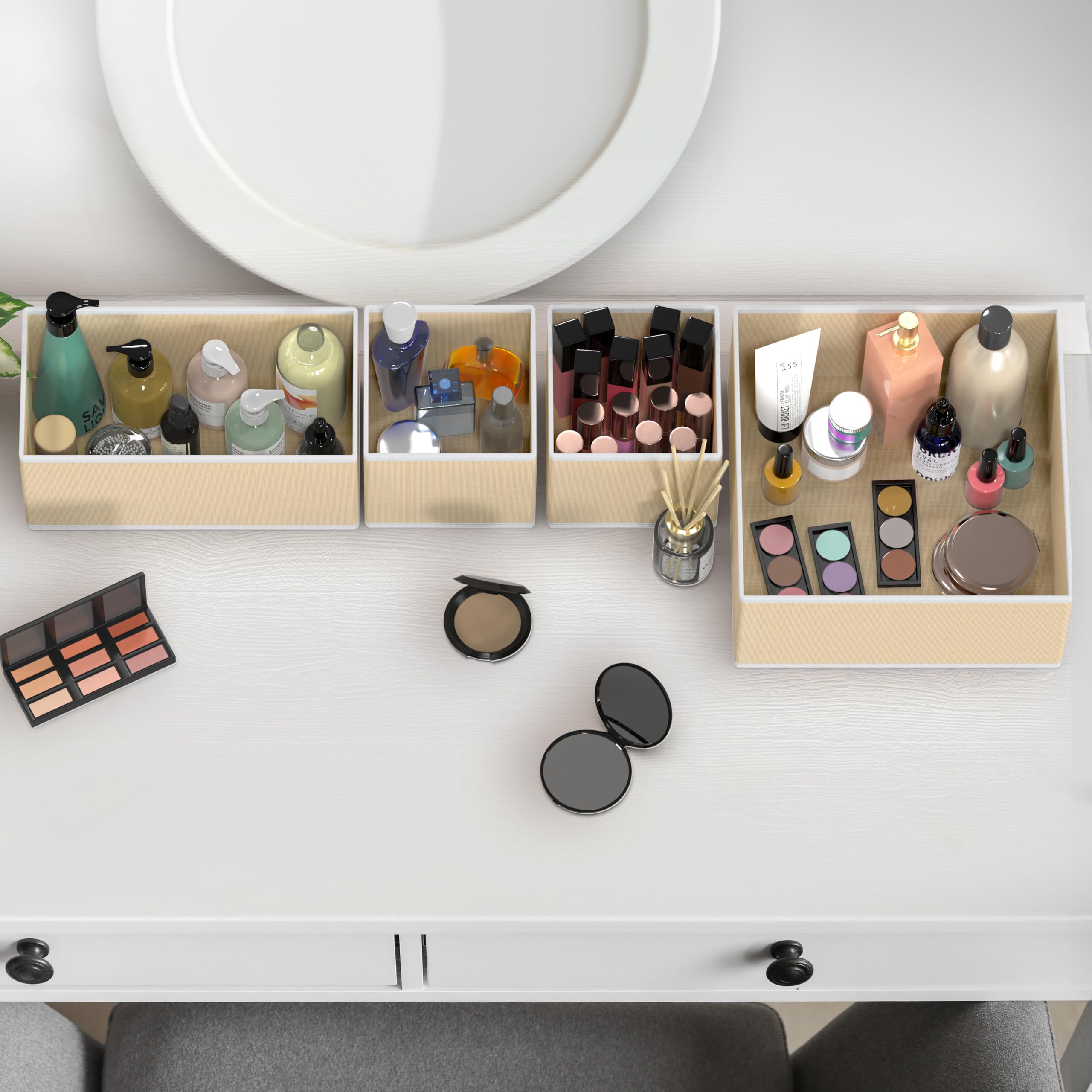 Simple Houseware bins fitted in an RV cabinet showing space optimization on the road