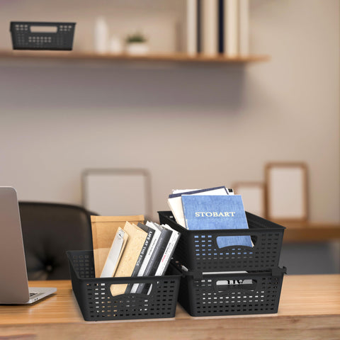 Simple Houseware basket held in hand to illustrate compact size and scale