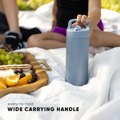 Simple Modern bottle on gym bench conveying readiness for workouts and hydration