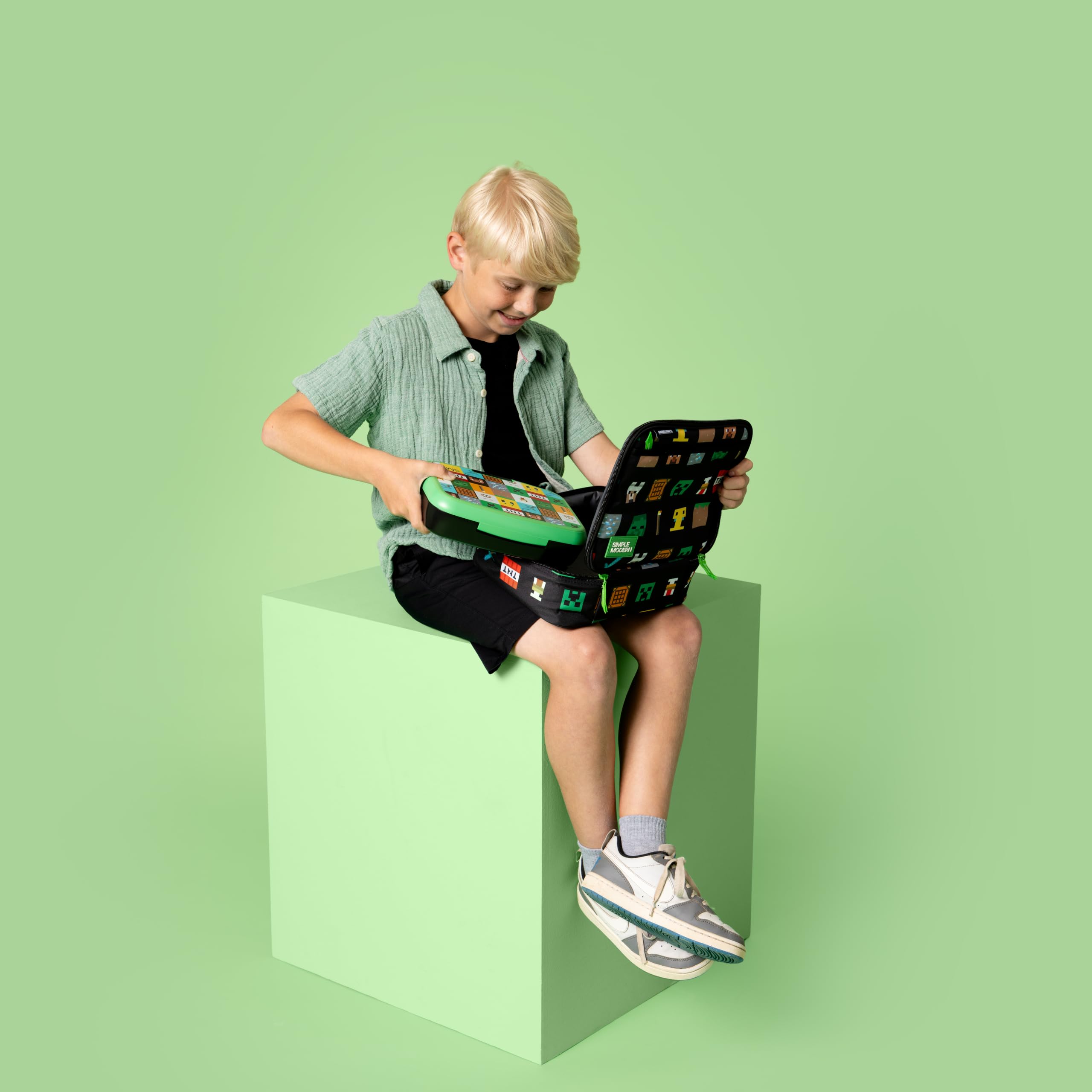 Simple Modern Minecraft Hadley holding a bento box and snacks for organized meals