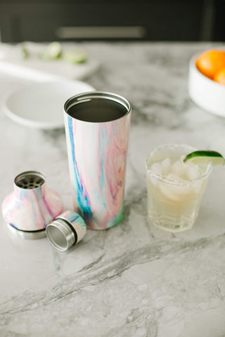 Simple Modern shaker being shaken to mix a cocktail showing easy grip and no-sweat benefit