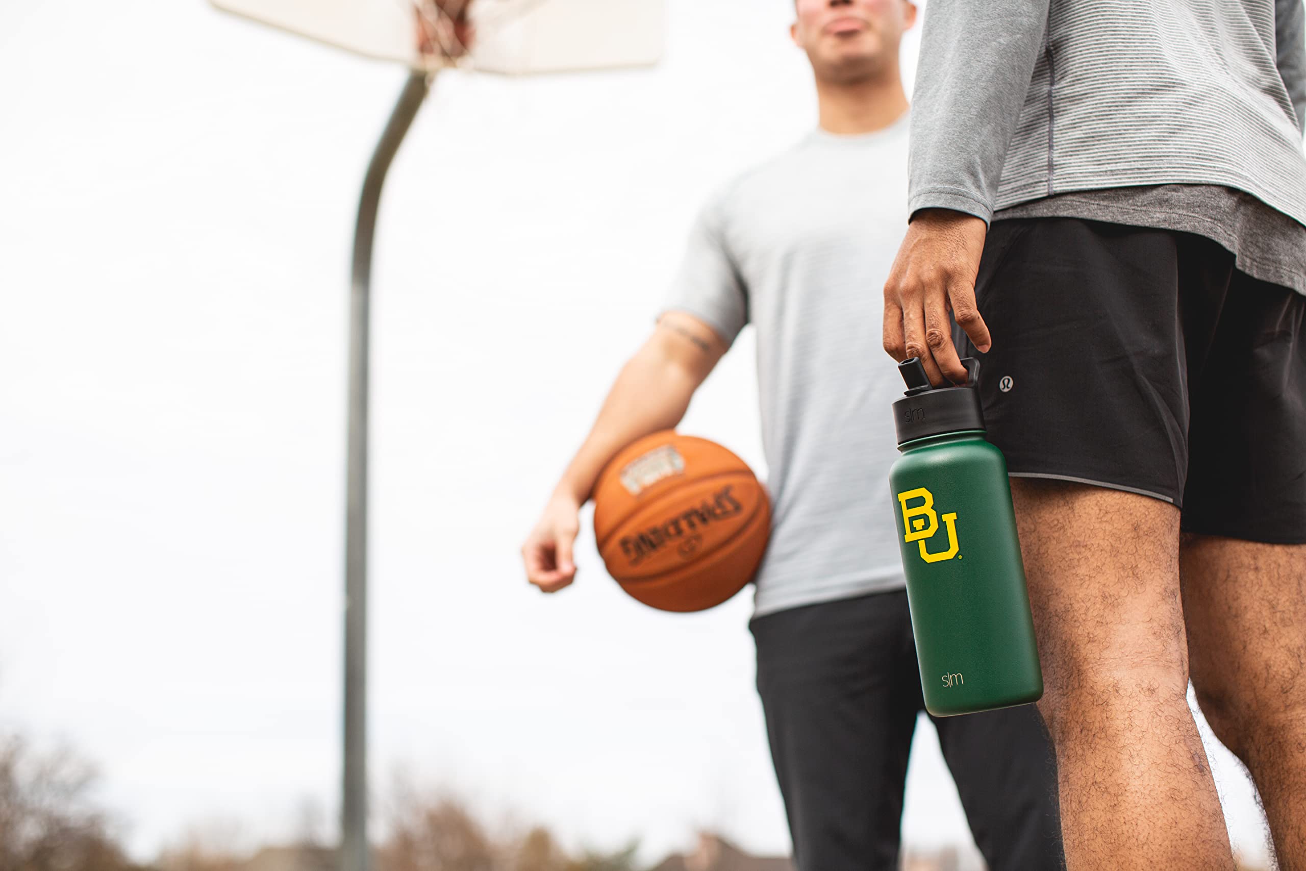 Simple Modern 32oz bottle in hand showing size and portability benefit