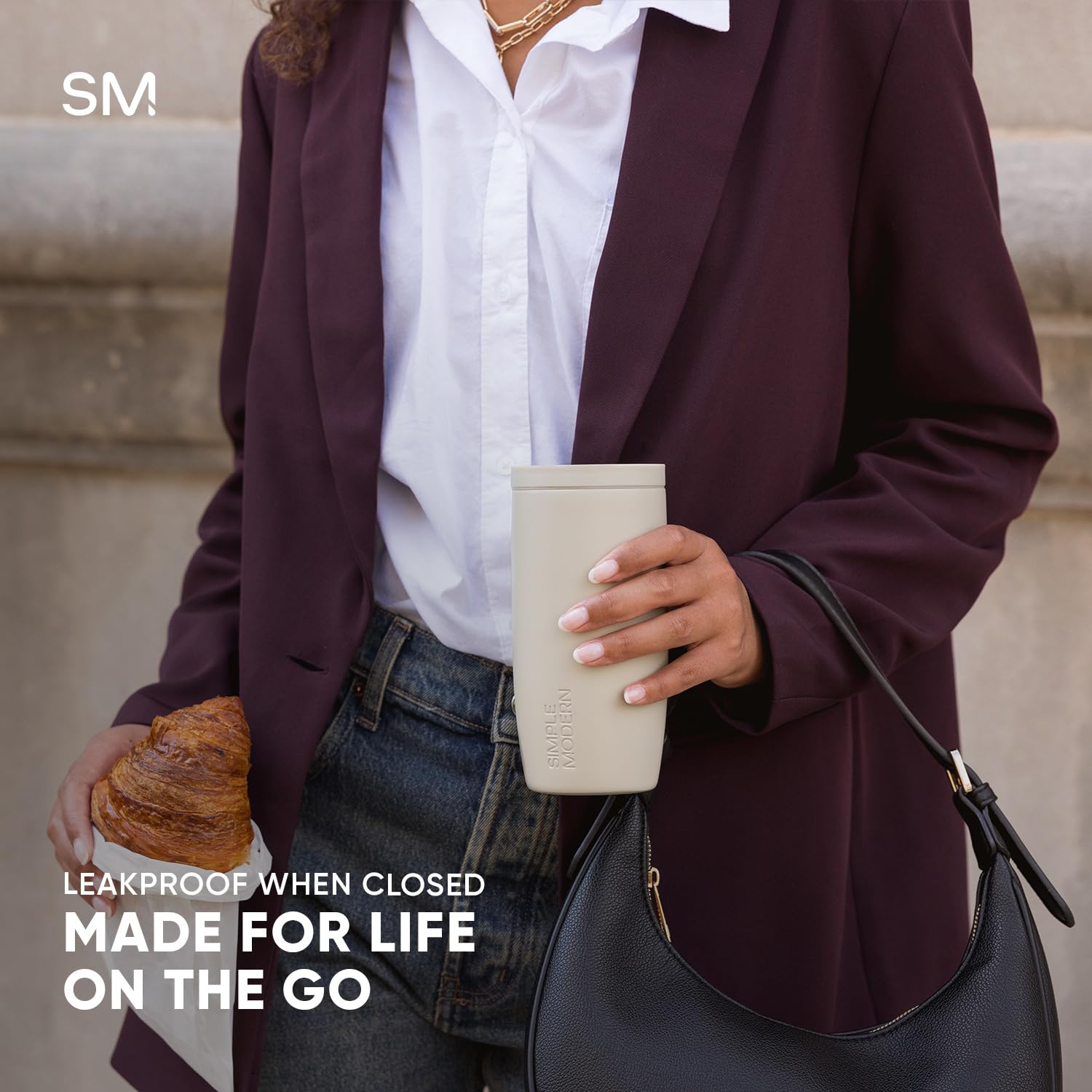 Simple Modern stainless steel side profile demonstrating durable, cupholder-friendly shape