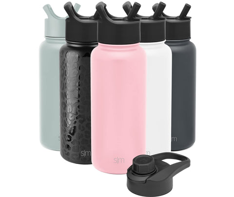 Simple Modern Summit next to a smartphone to show 32oz scale and convenient portability benefit