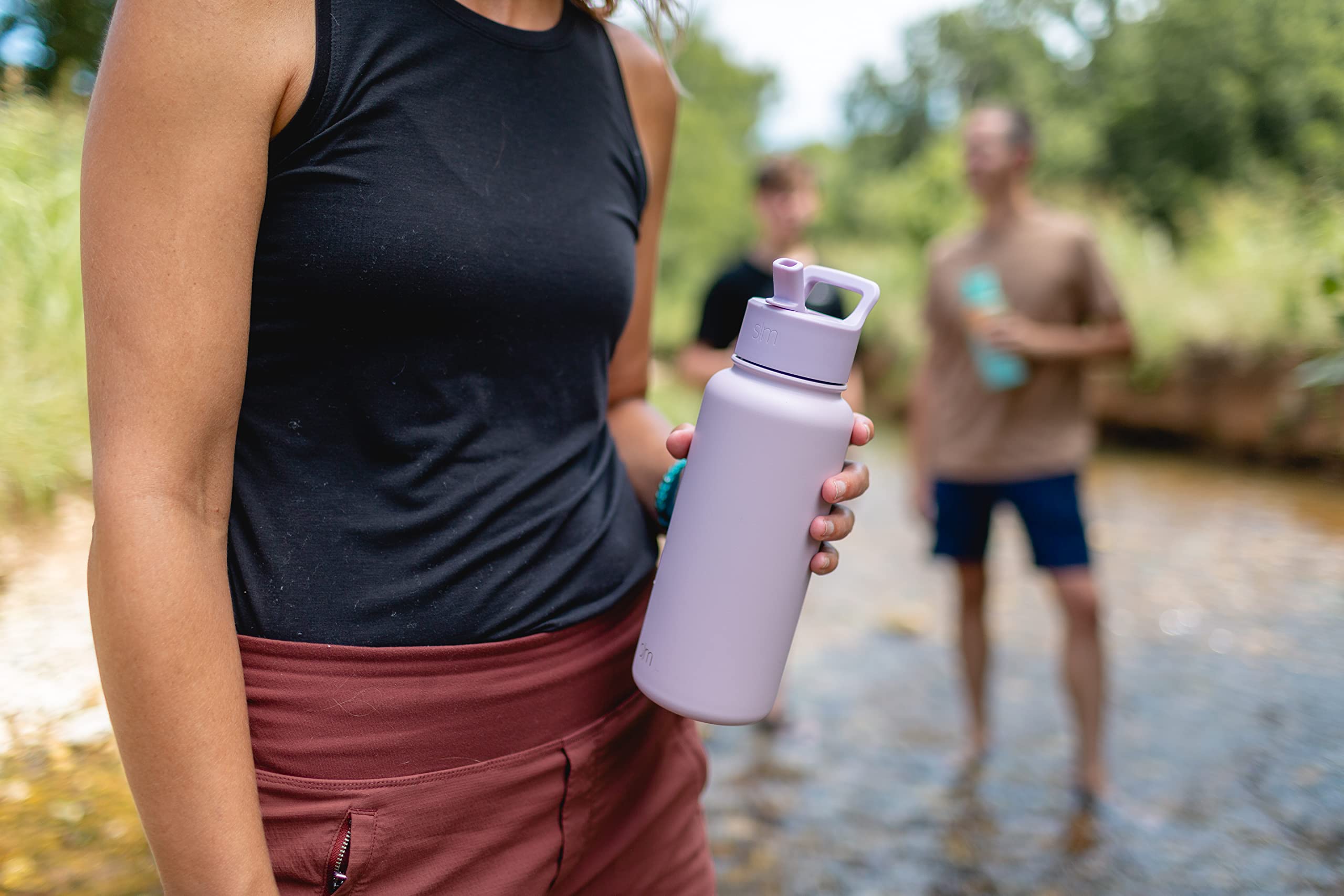 Simple Modern next-to-water-bottle comparing 32oz size for portable capacity