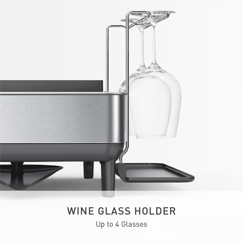 simplehuman wine glass holder in use securing stems and saving plate space benefit