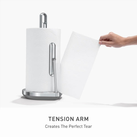simplehuman finger loop being used to lift holder for quick cleanup