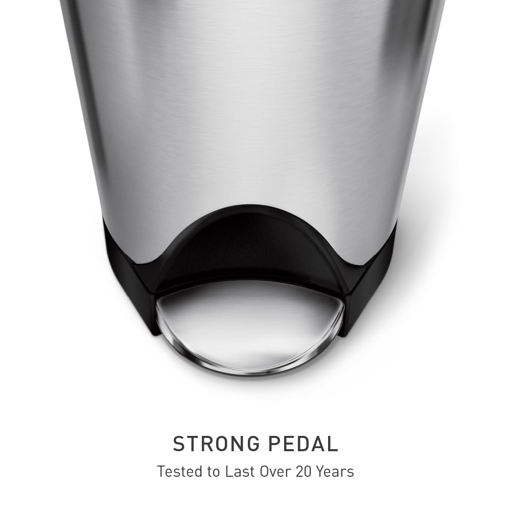 simplehuman butterfly lid opened under low countertop providing maximum clearance