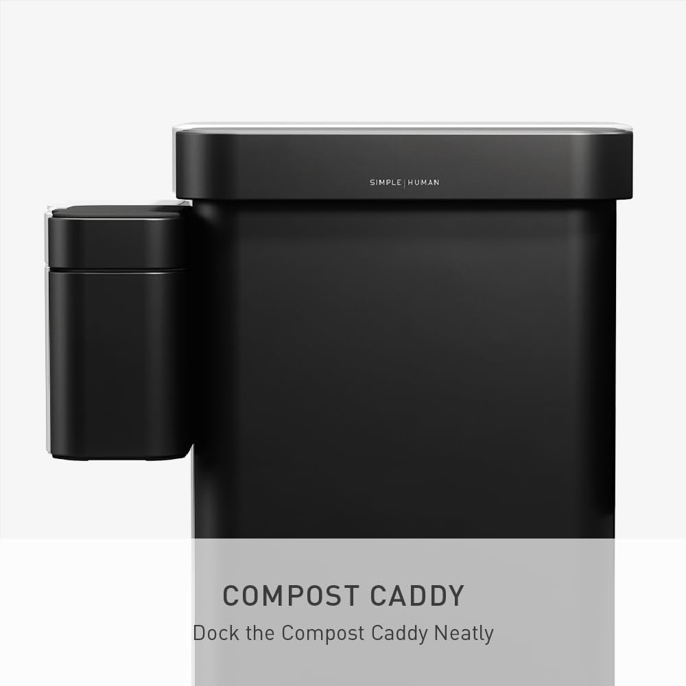 simplehuman step can in a modern kitchen showing discreet fit beside cabinets