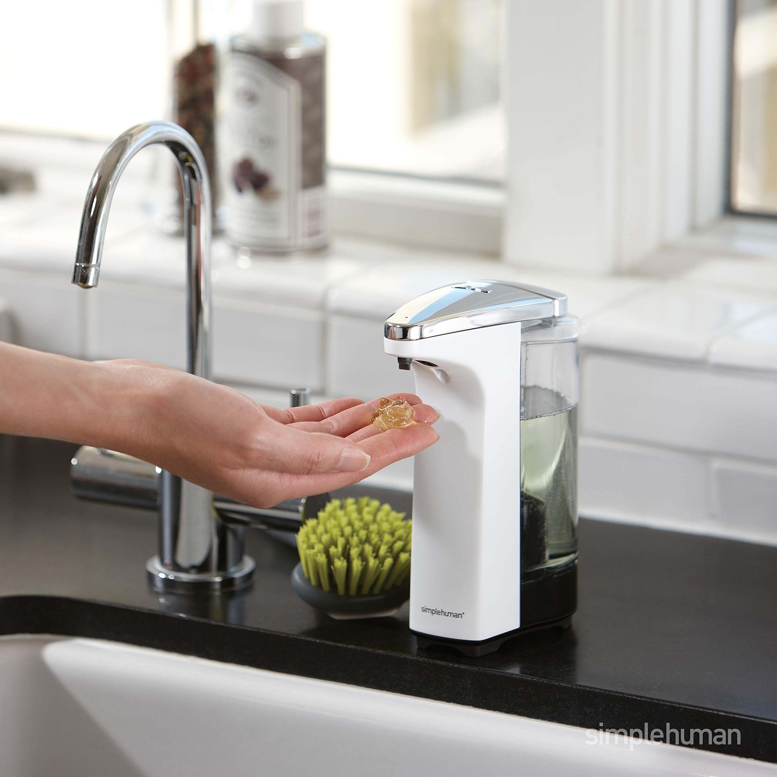 simplehuman close-up of no-drip spout showing silicone valve benefit: prevents countertop mess