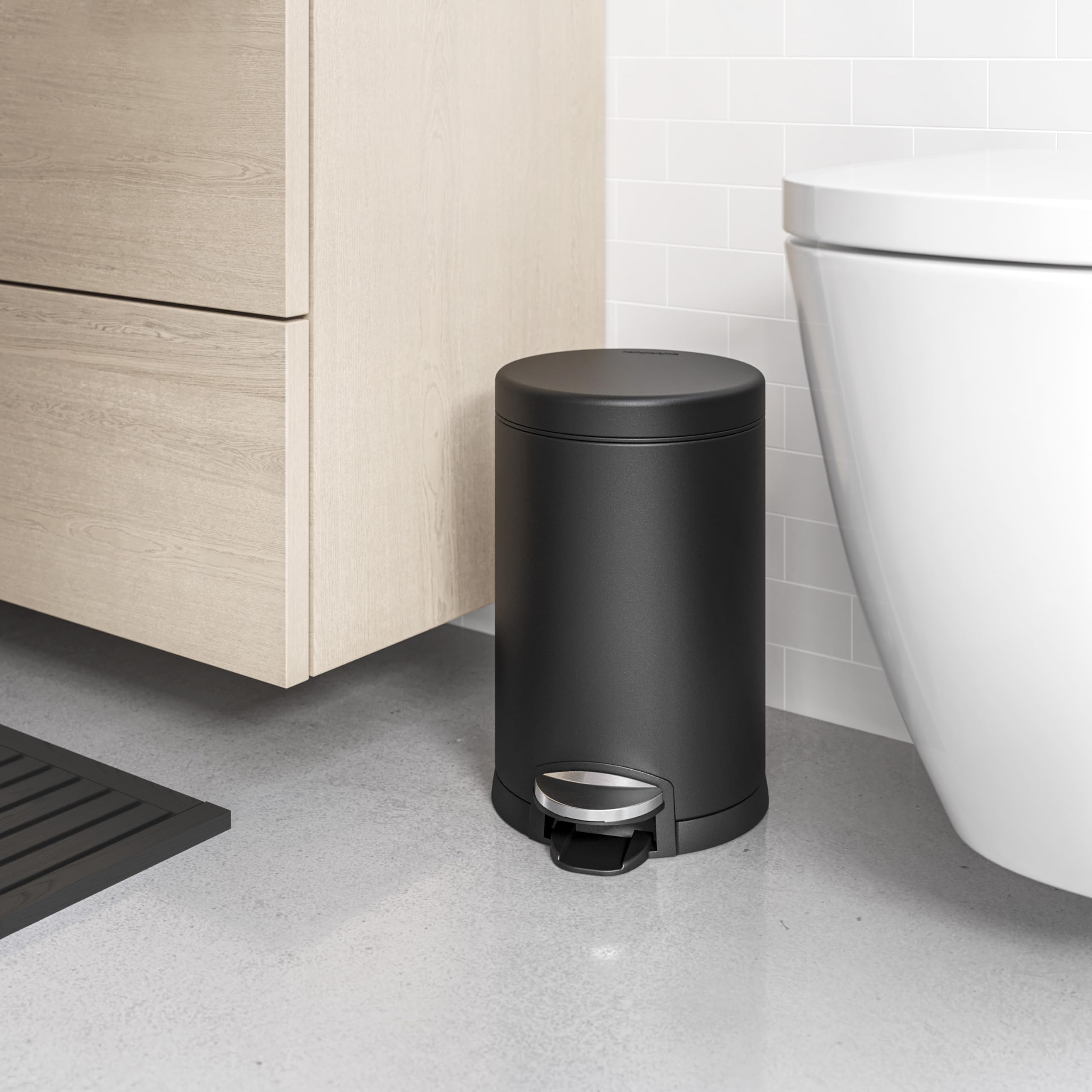 simplehuman next to toilet showing scale and space-saving benefit