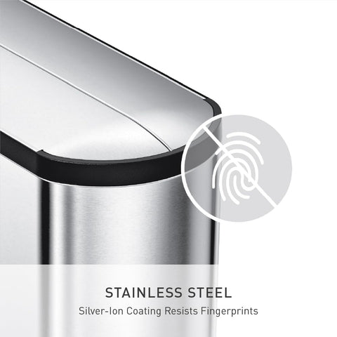 simplehuman trash can beside cabinet showing slim footprint for small spaces
