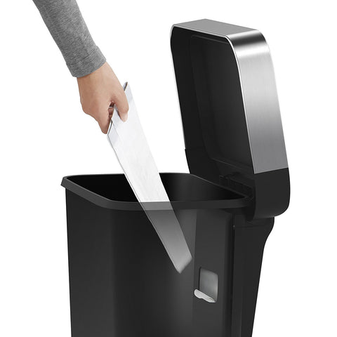 simplehuman in kitchen lifestyle showing silent Lid Shox closure and organized countertop