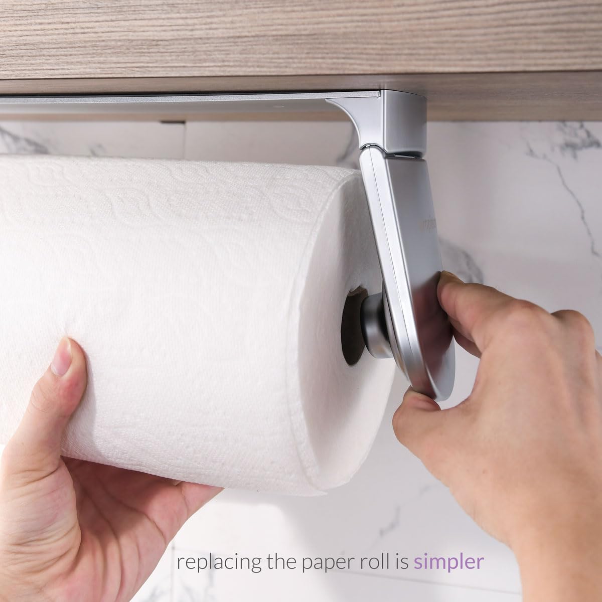simpletome paper roll being torn one-handed for easier kitchen tasks