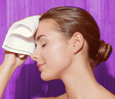 SIMPLI-MAGIC hanging in bathroom demonstrating fit on towel bar and convenience