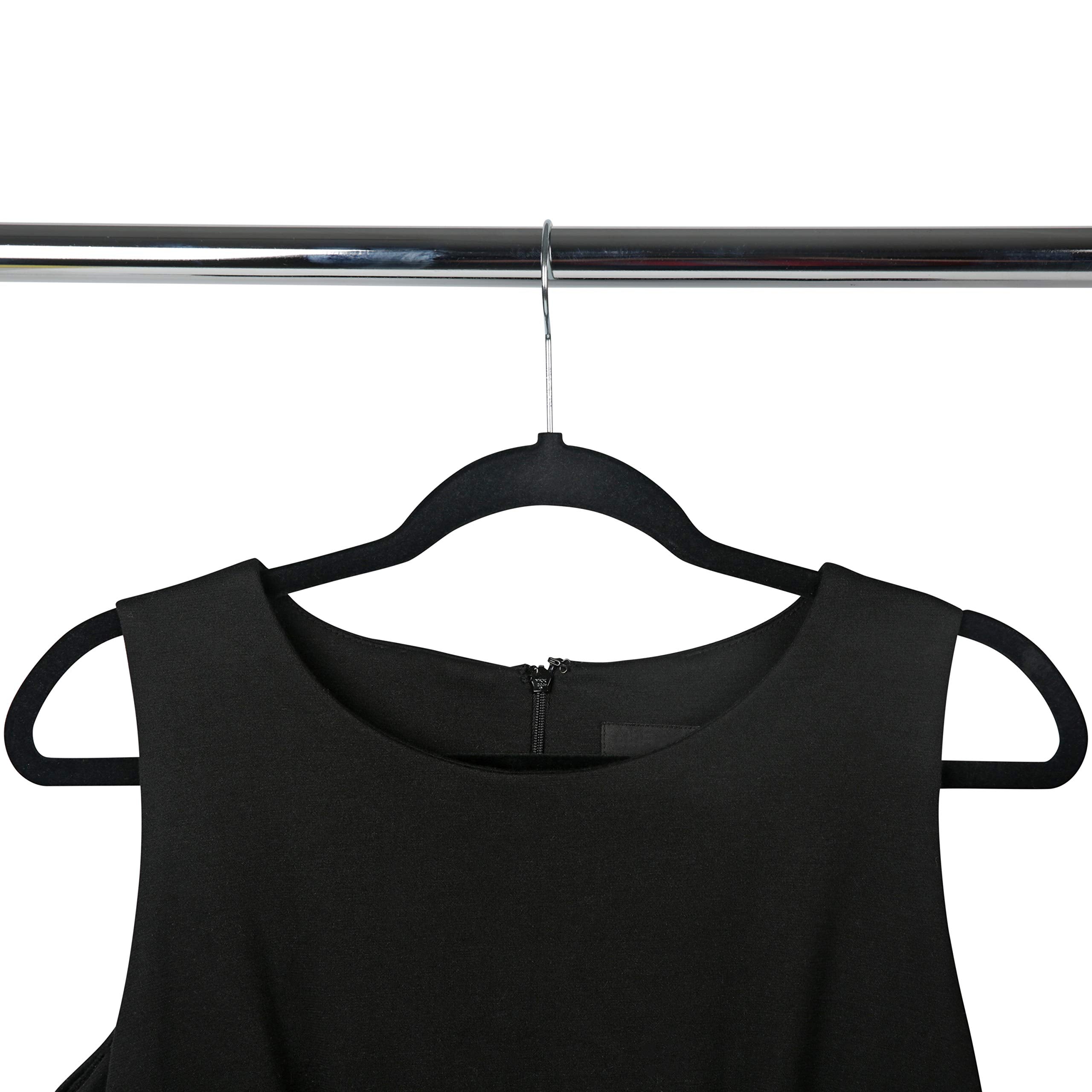Simplify multiple hangers neatly lined on a closet rod demonstrating space-saving organization