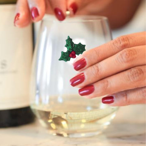 Simply Charmed charm secured to a champagne flute showing compatibility and festive look