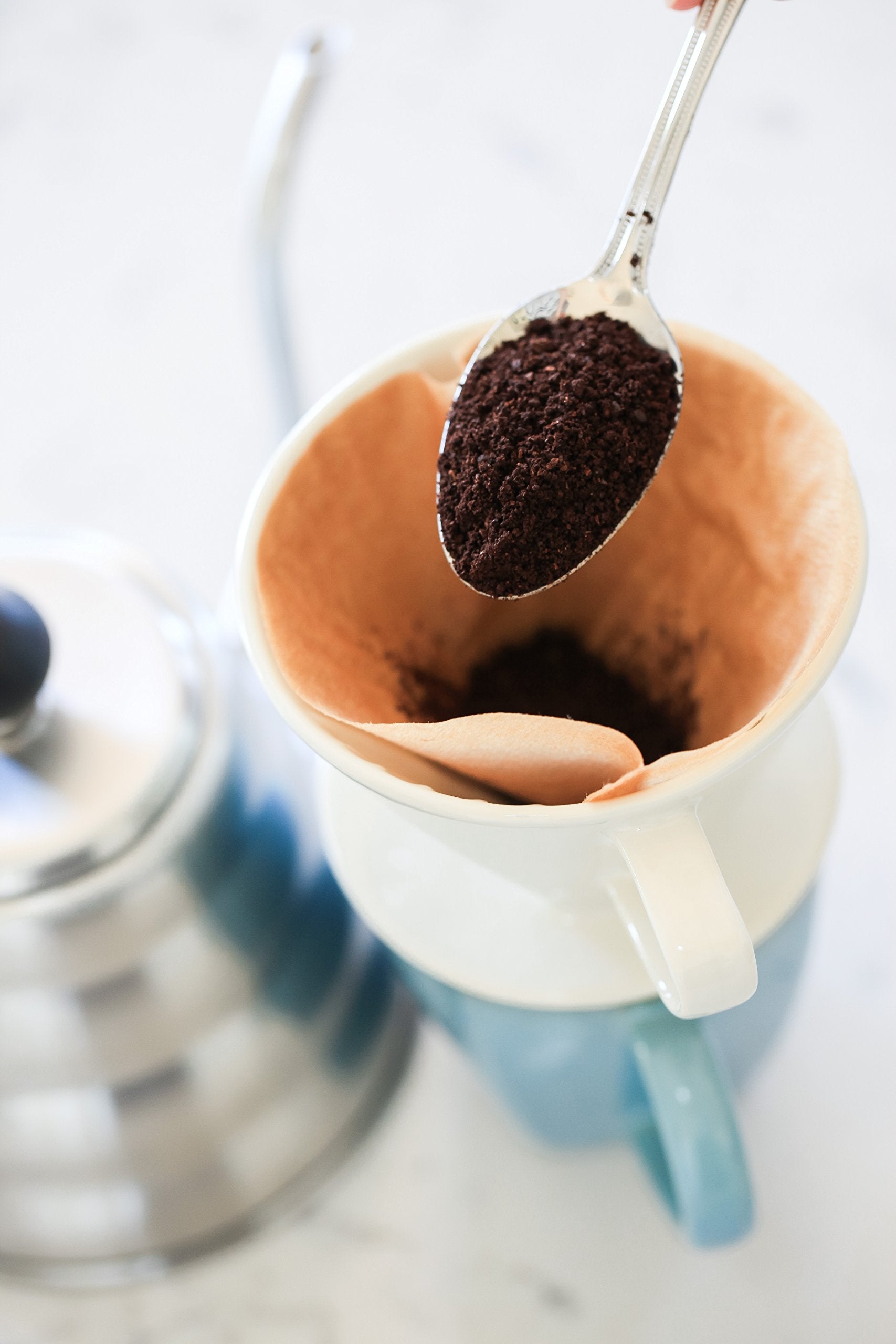 Simply Charmed dripper sitting on mug to show scale, demonstrating compact size and convenient fit