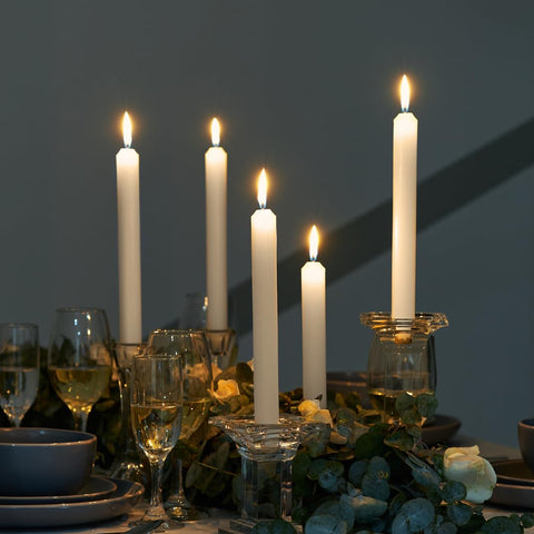 Simply Soson ivory tapers used in elegant table setting creating ambience