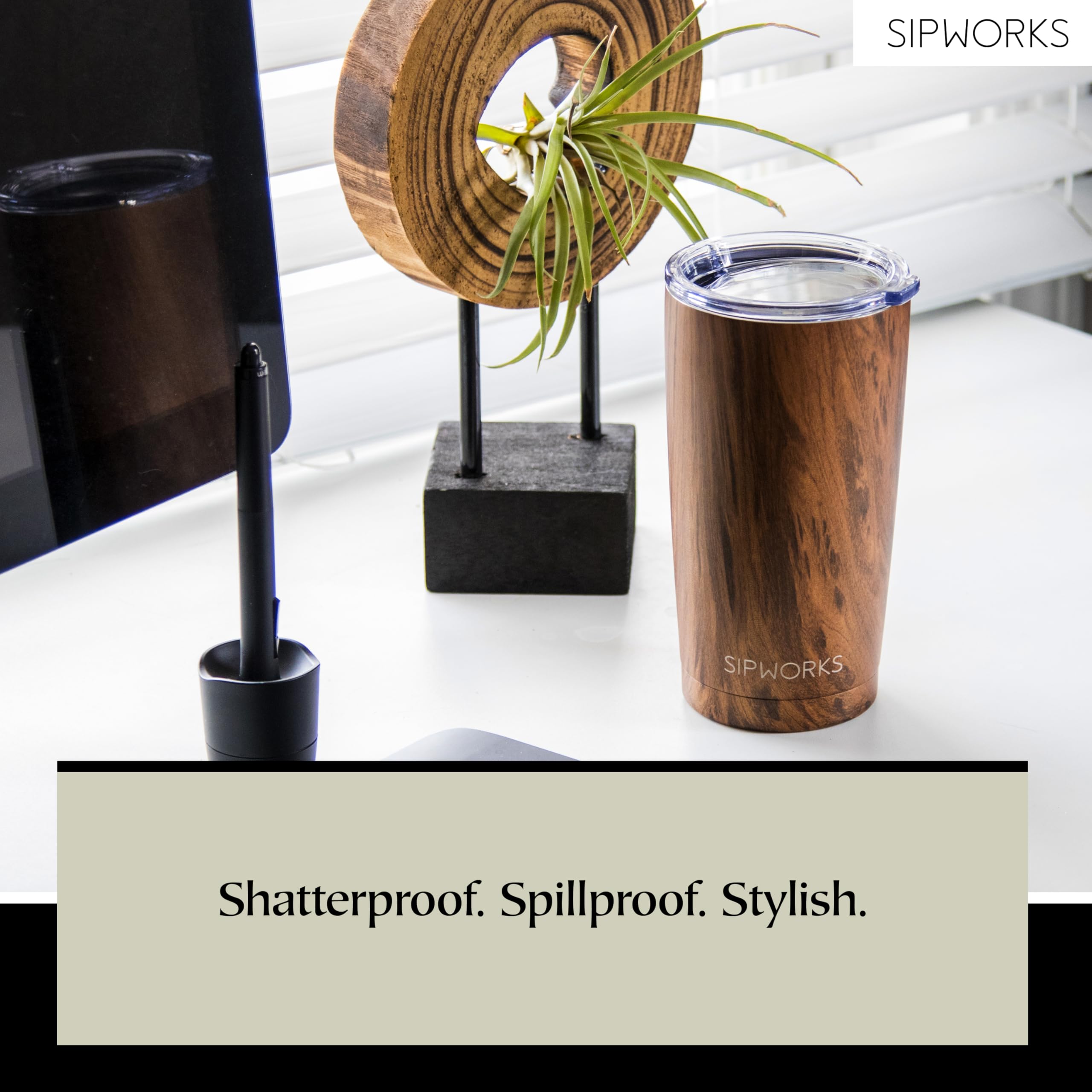 Sipworks tumbler next to smartphone showing 20 oz capacity and scale