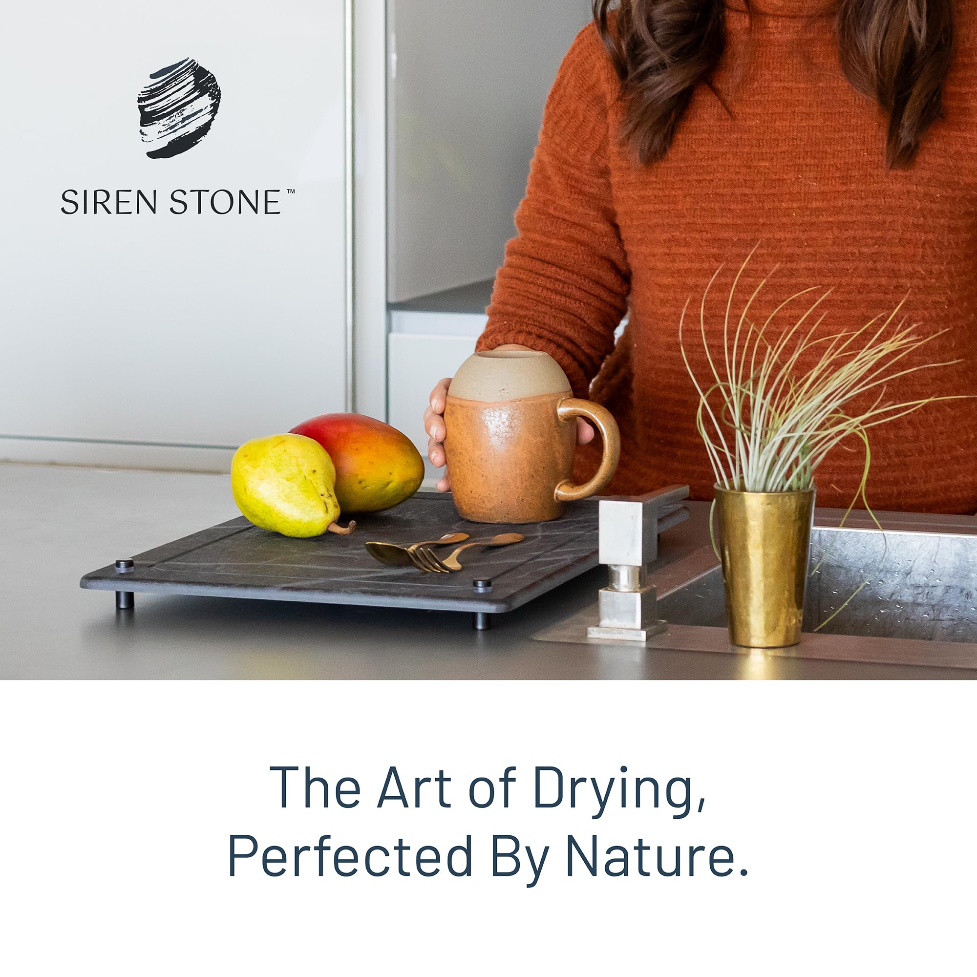 Siren Stone held in hand for size comparison showing space-saving benefit