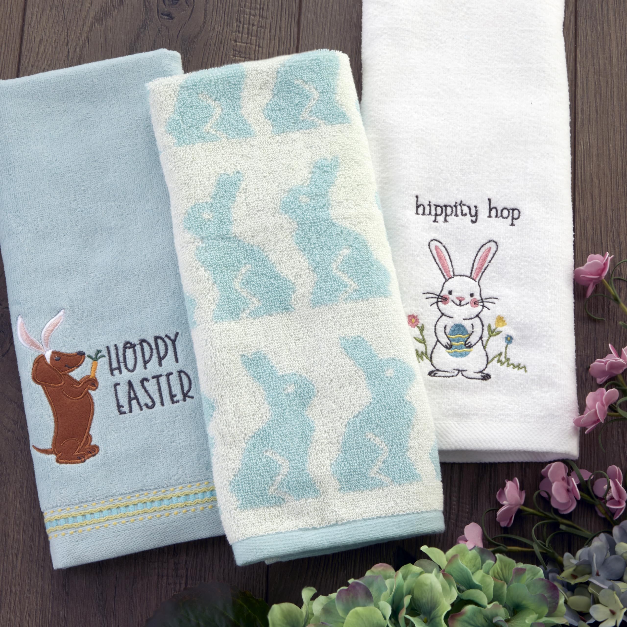 SKL Home towel held in hand showing real-life size and scale convenience