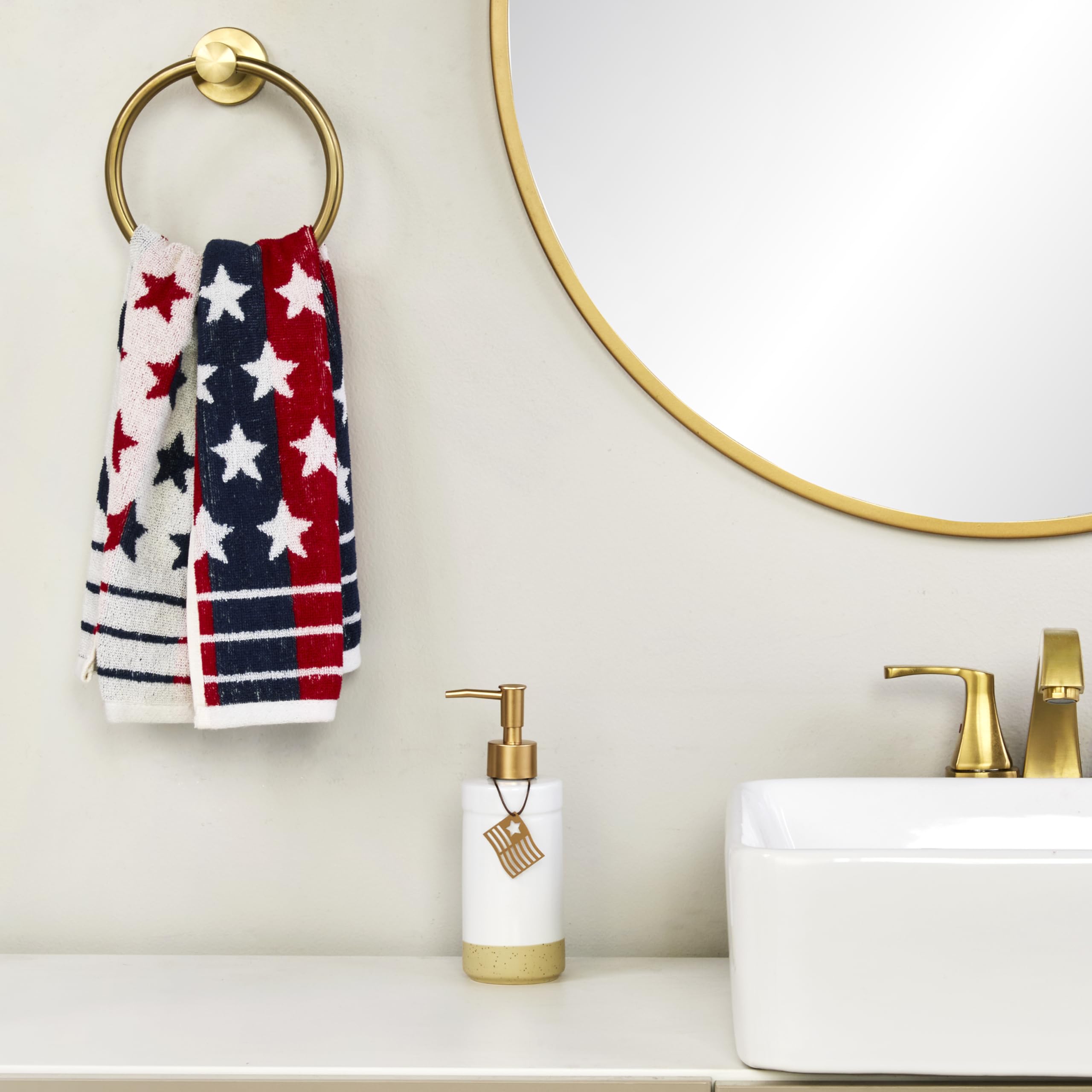 SKL Home towel on countertop beside dishware showing 16x25 size reference